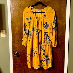 Boho Style Dress with tie front and lined except for sleeves.